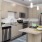 a kitchen with a bar stool