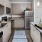 a kitchen with white cabinets