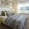 a bedroom with a bed and a chair