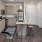 a kitchen with a table and chairs